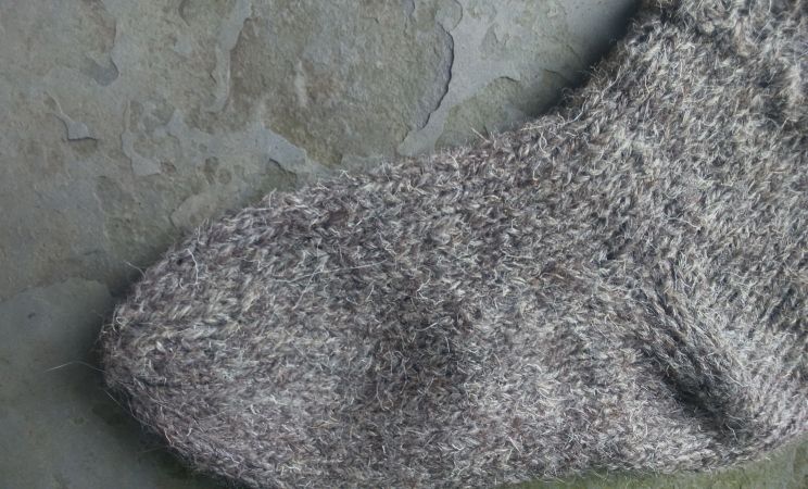 Herdwick Wool Socks: image of socks made by joining a single flat piece together using grafting stitch for an invisible seam