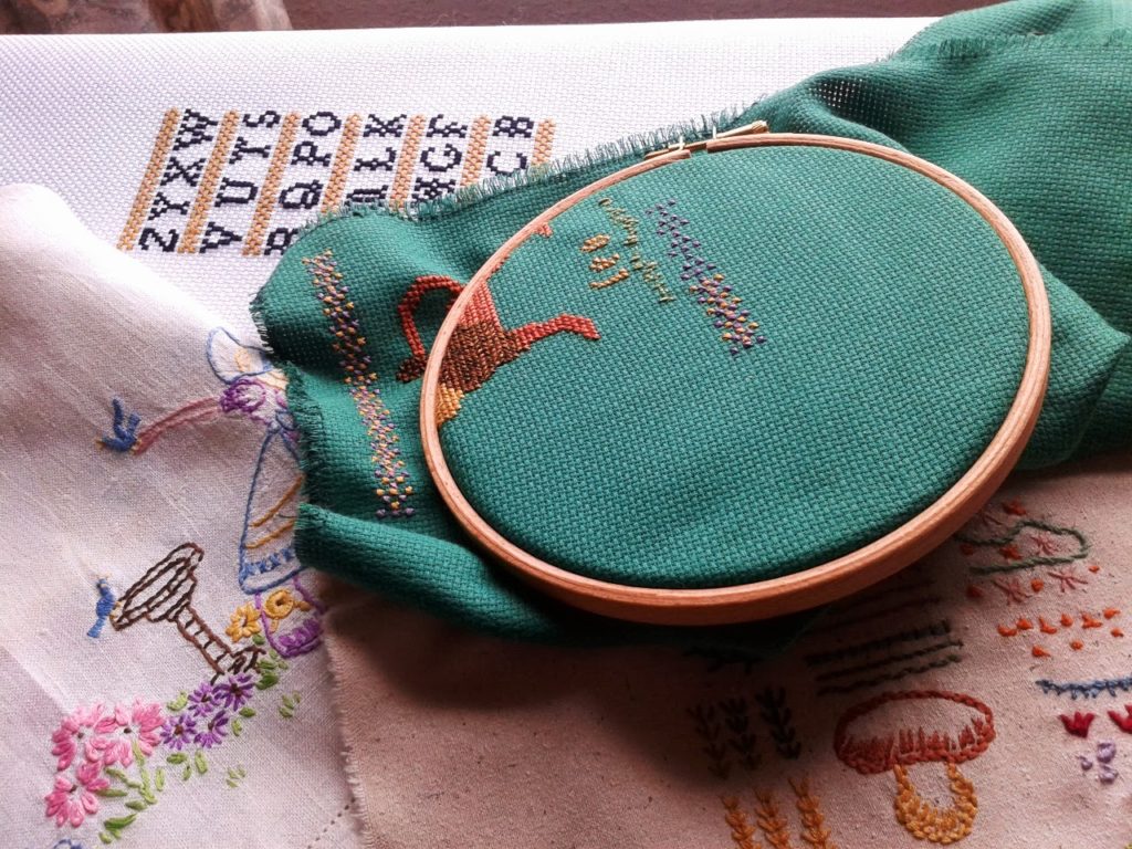 Embroidery and cross-stitch A foray into furninshings. Image of an collection of embroidery