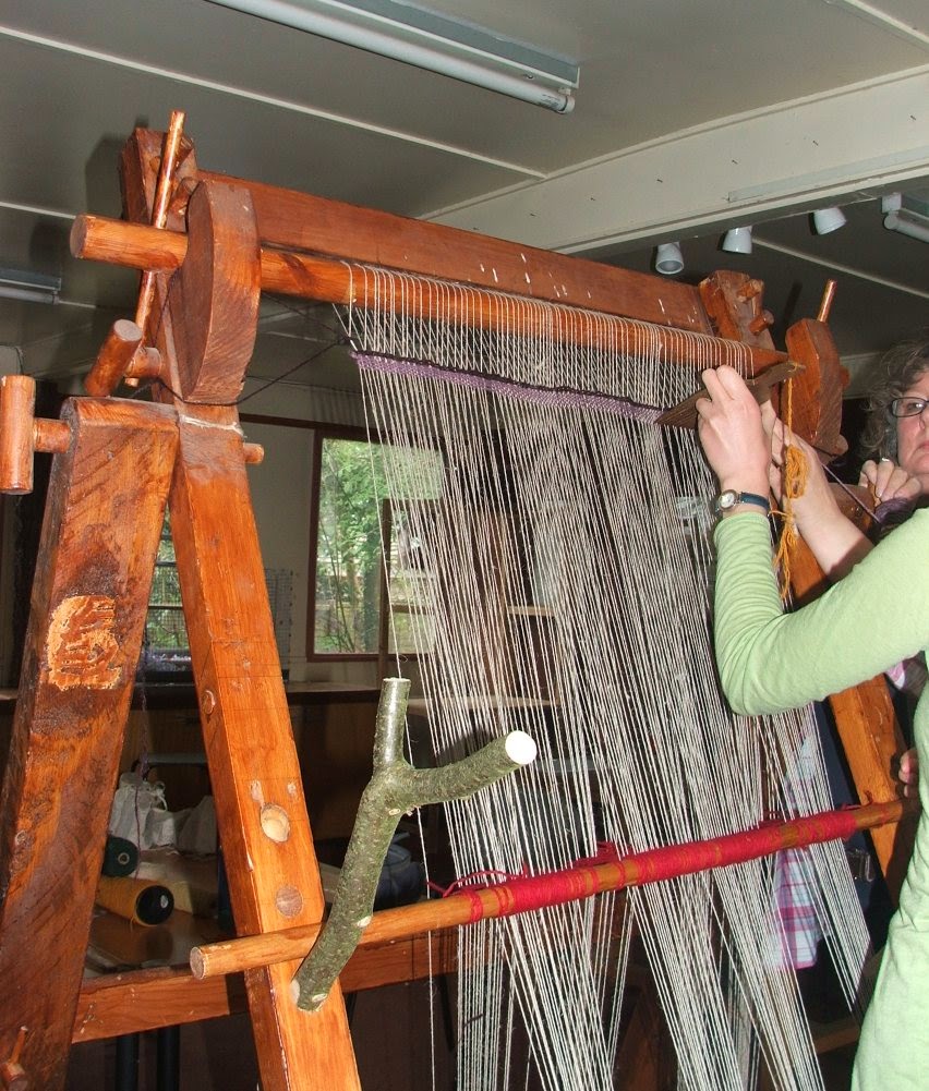 Warp set up on the loom - beginning weaving in the weft