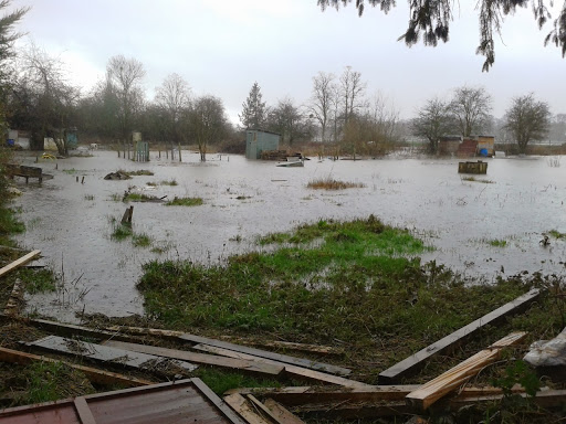 Floodplain homestead - photo of my former allotment under a flood to illustrate the problems of growing crops on or near a floodplain