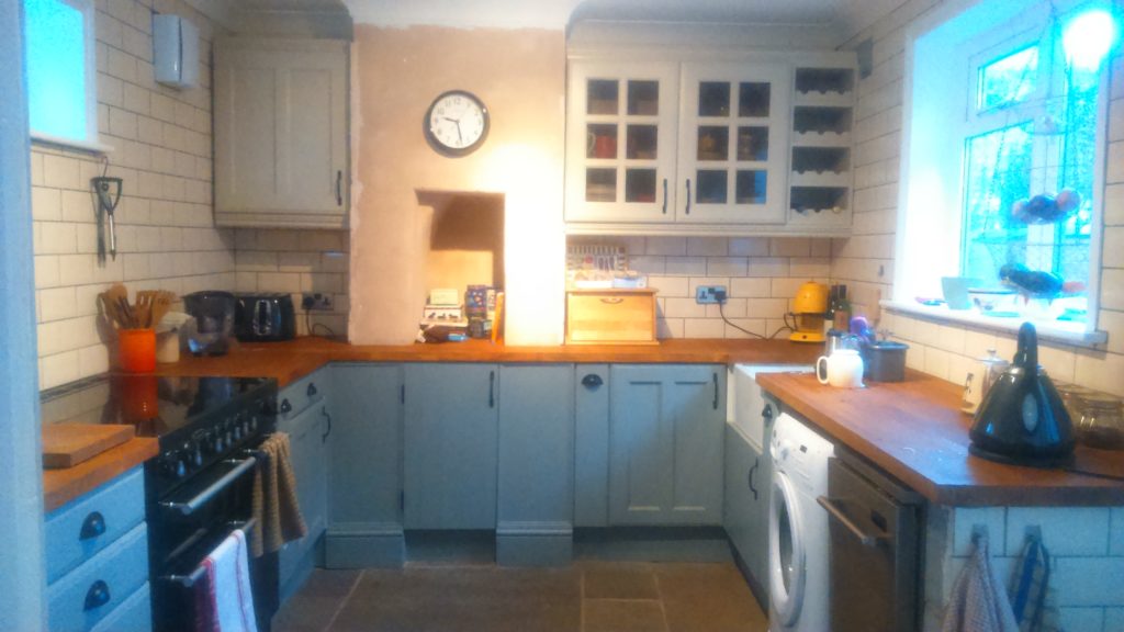 Kitchen complete, after installing repurposed kitchen carcass units and repainted cabinet doors