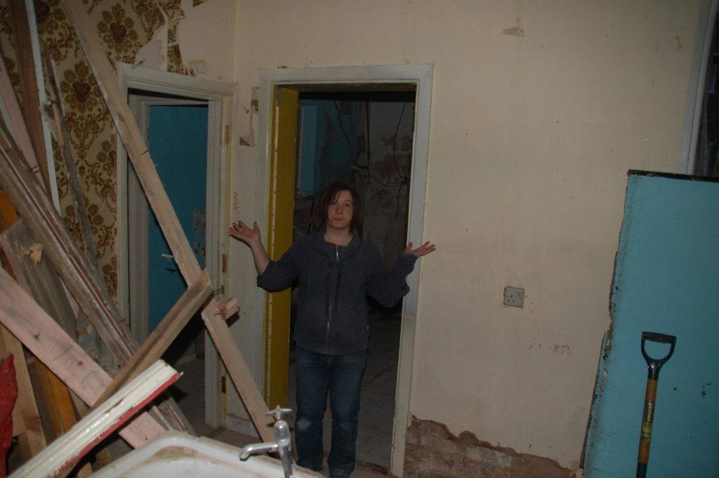 Frugal and Zero Waste House Renovations: dining room full of gutted material from kitchen and bathroom, ready for the skip