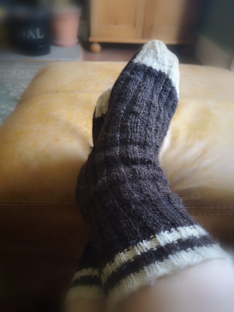 Refootable socks and a mending culture revival - image of refootable socks, modelled