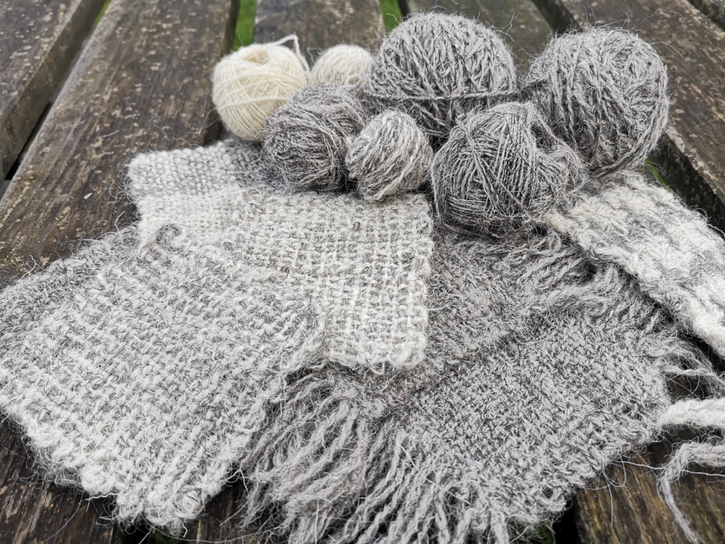 Herdwick and Swaledale Yarn, Local Cloth - weaving swatches made from Herdwick and Swaledale handspun yarn, with balls of handspun yarn