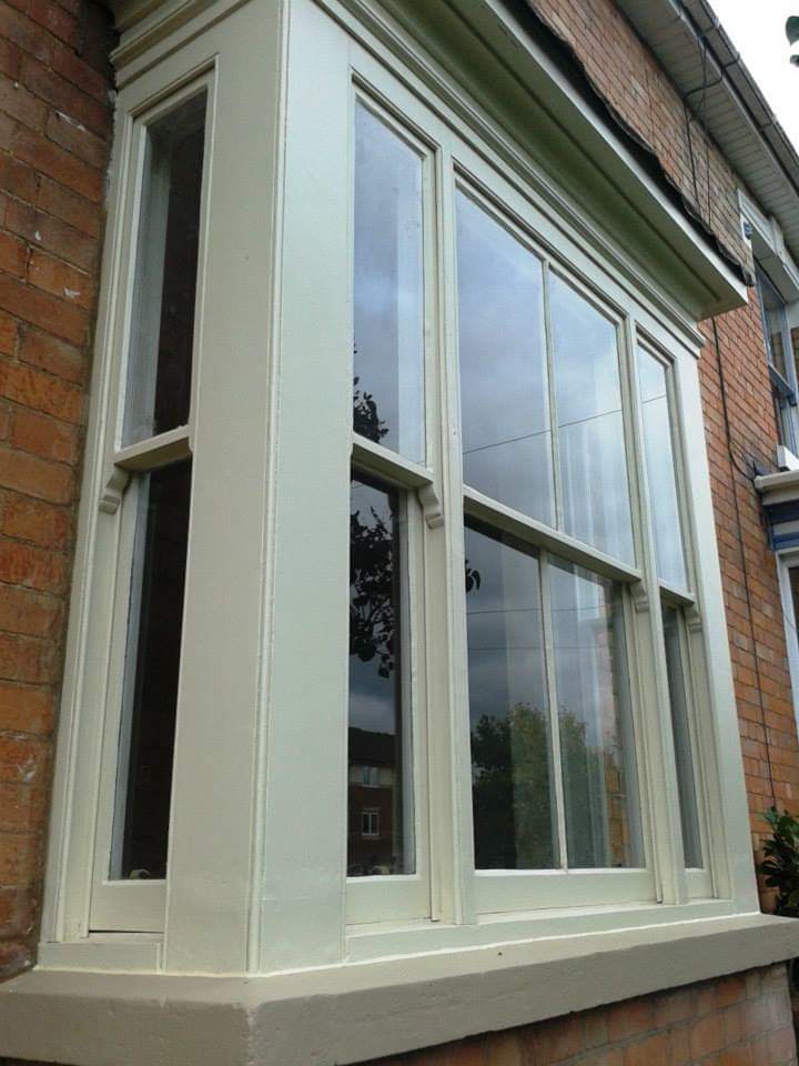 Image of restored and repainted box bay window - wood frame painted in Farrow & Ball Lime White