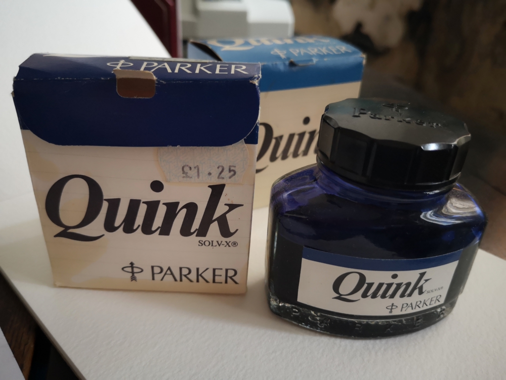 Zero Waste and Plastic-free Writing: Image of bottles of dark blue and Royal blue Parker Quink ink, many years old. Hence the very cheap price tag!